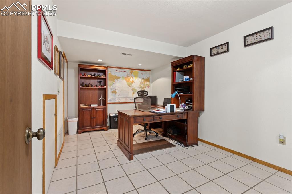 64 Highland Road Palmer Lake, CO 80133 - Photo 33 of 45 Office/Craft Room with 12 x 12 Tile Flooring!