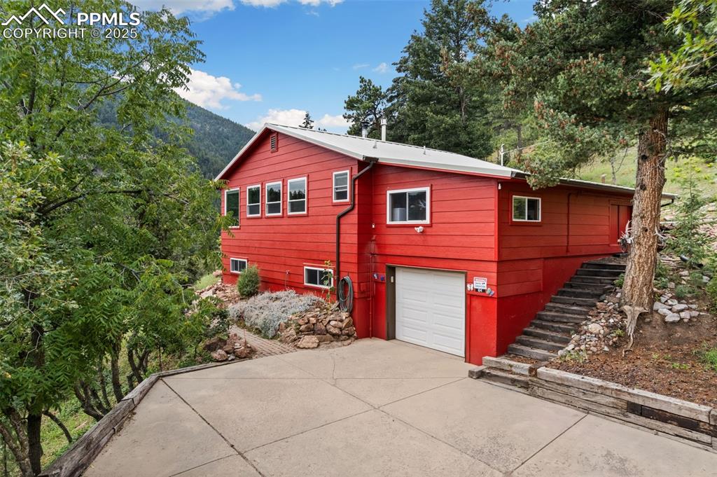 64 Highland Road Palmer Lake, CO 80133 - Photo 8 of 45 Long Driveway to this Pristine Home!