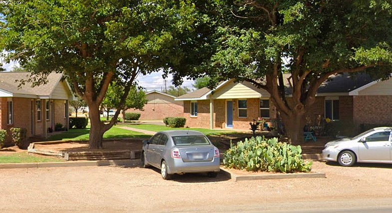 1100 12th Street Seagraves, TX 79359 - Photo 6 of 6 a front view of a house with a yard