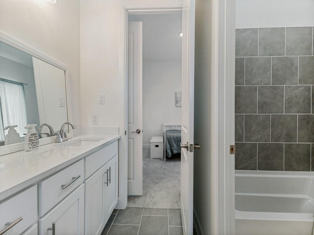 1631 Yorkie Drive Forney, TX 75126 - Photo 14 of 26 Jack n' Jill Bath