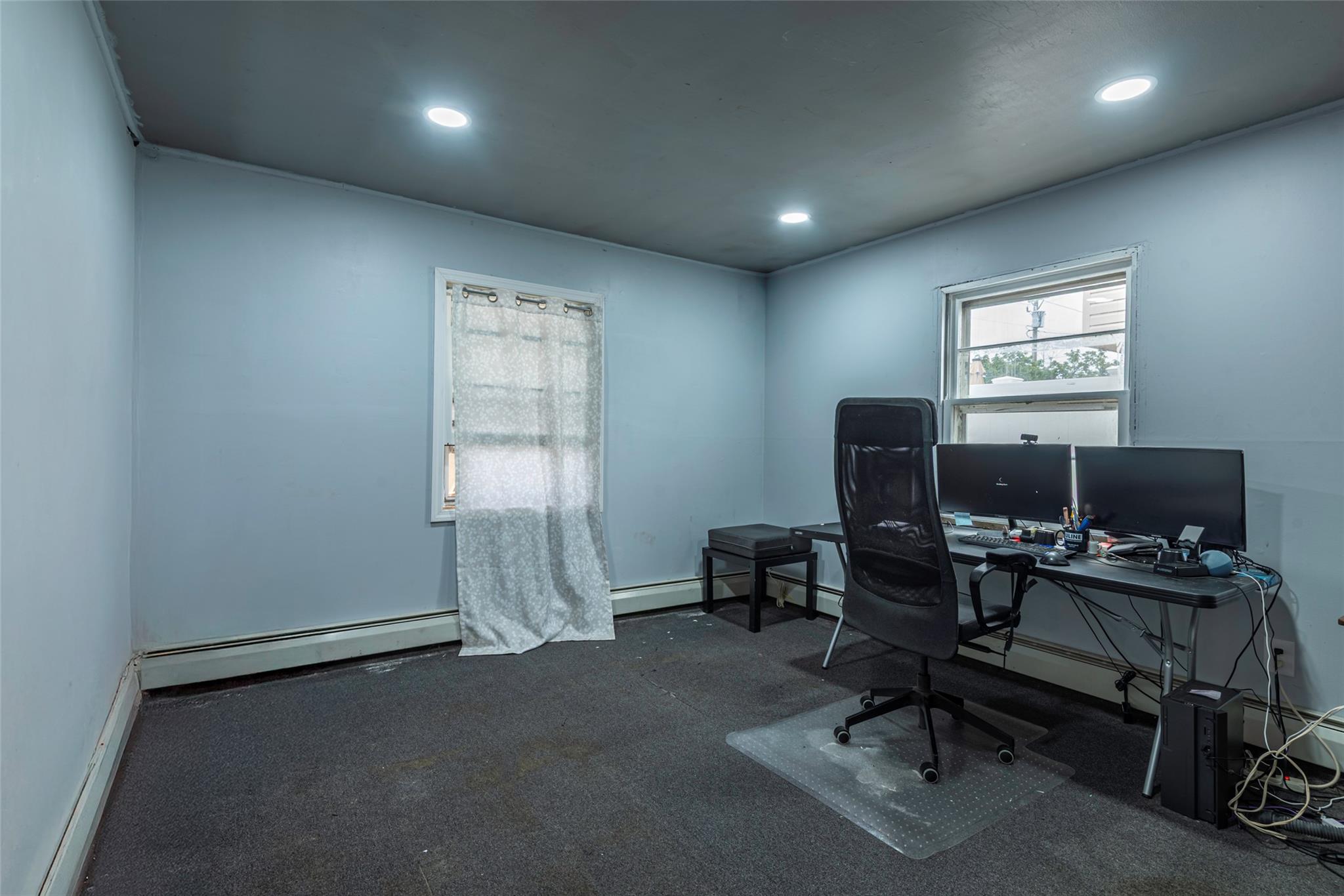 22 Lowland Road Levittown, NY 11756 - Photo 13 of 38 Office area featuring a baseboard radiator and recessed lighting