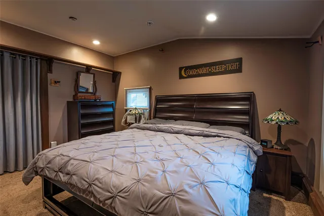 a bathroom with a toilet a sink and a shower