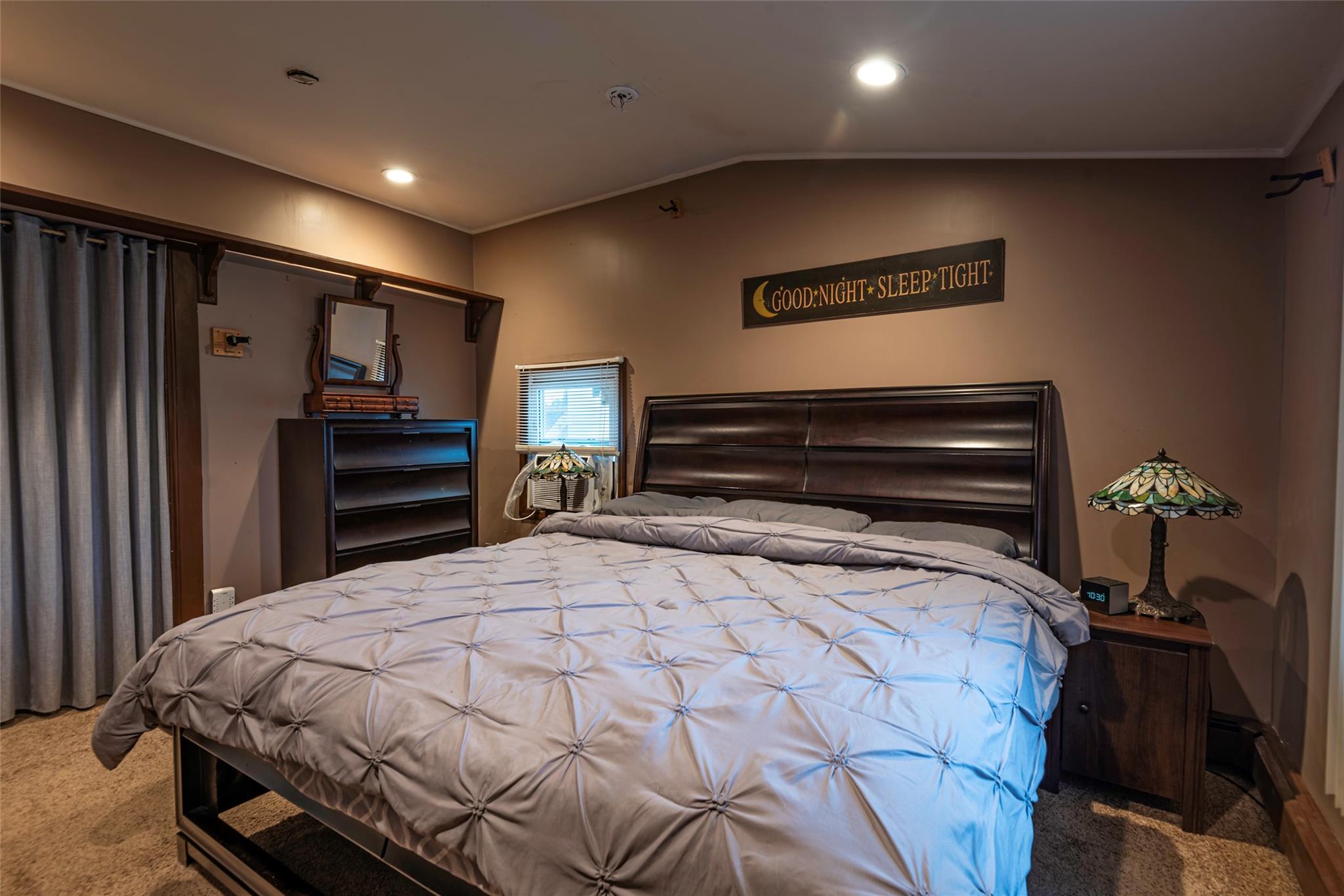 22 Lowland Road Levittown, NY 11756 - Photo 17 of 38 Carpeted bedroom with lofted ceiling and recessed lighting