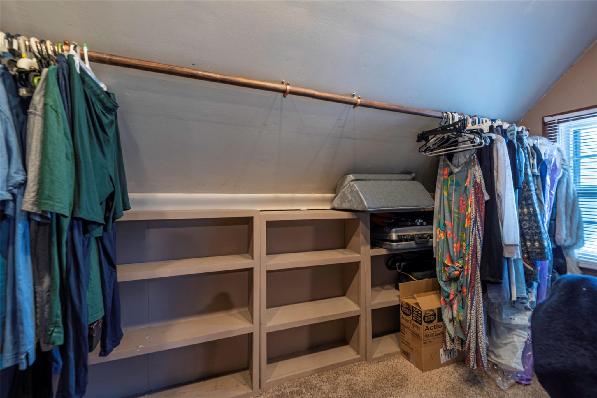 22 Lowland Road Levittown, NY 11756 - Photo 20 of 38 Walk in closet featuring vaulted ceiling