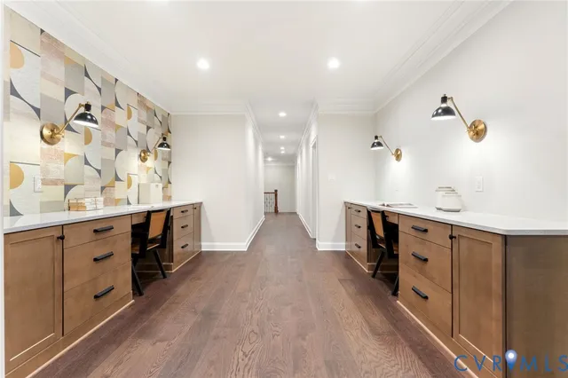 a kitchen with stainless steel appliances a sink stove and cabinets