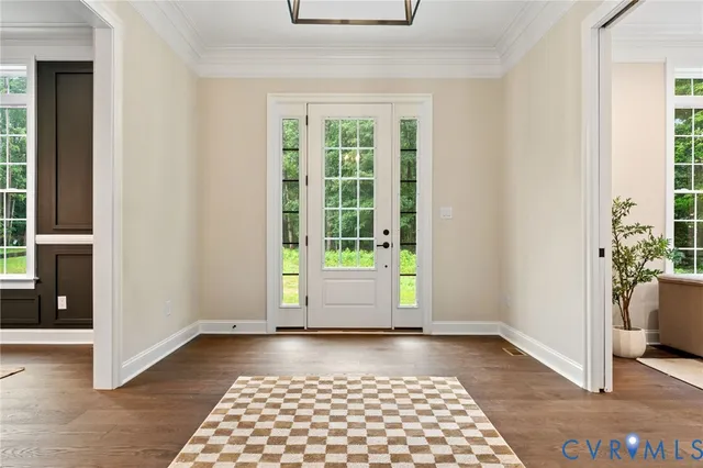 a kitchen with kitchen island granite countertop a stove and a sink