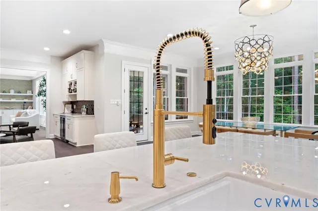 a spacious bedroom with a large bed and windows