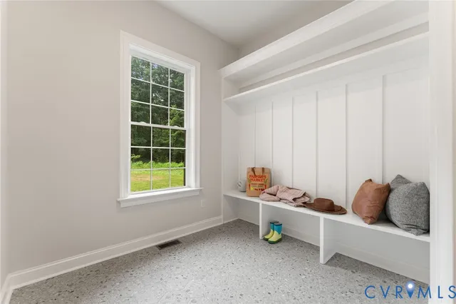 a bathroom with a shower and a bath tub