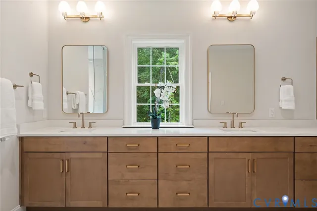 a view of cabinets chair and wooden floor