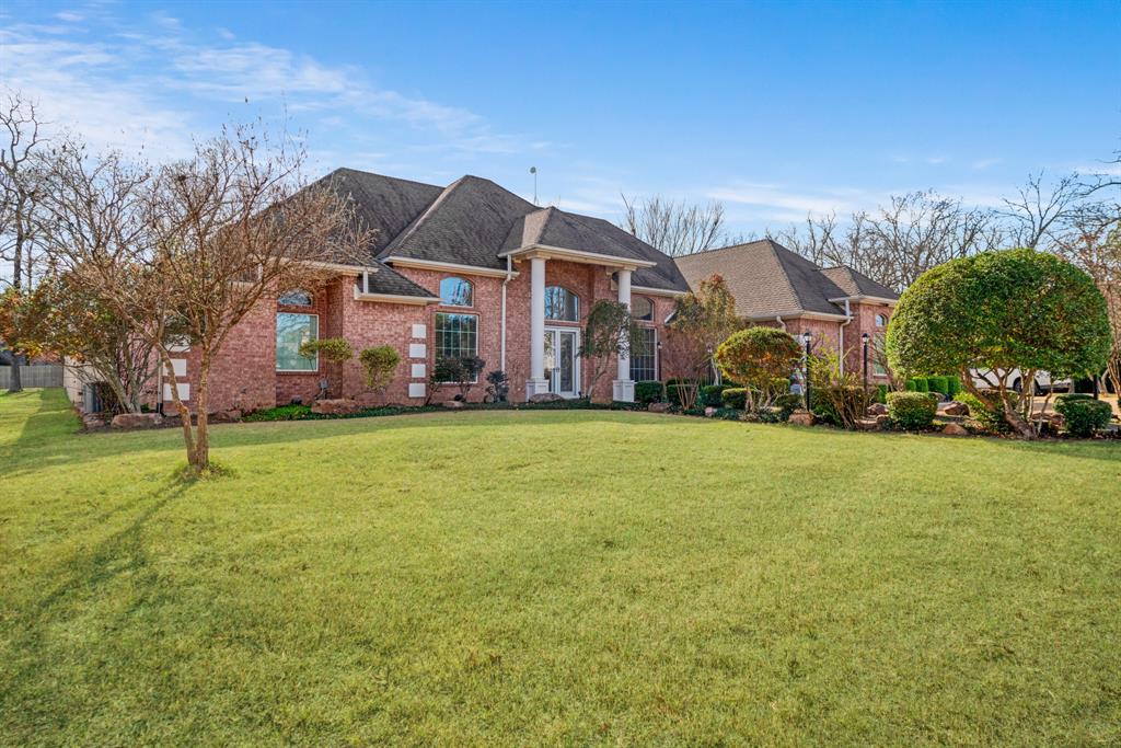 283 Butternut Lane Powderly, TX 75473 - Photo 3 of 32 a front view of house with yard