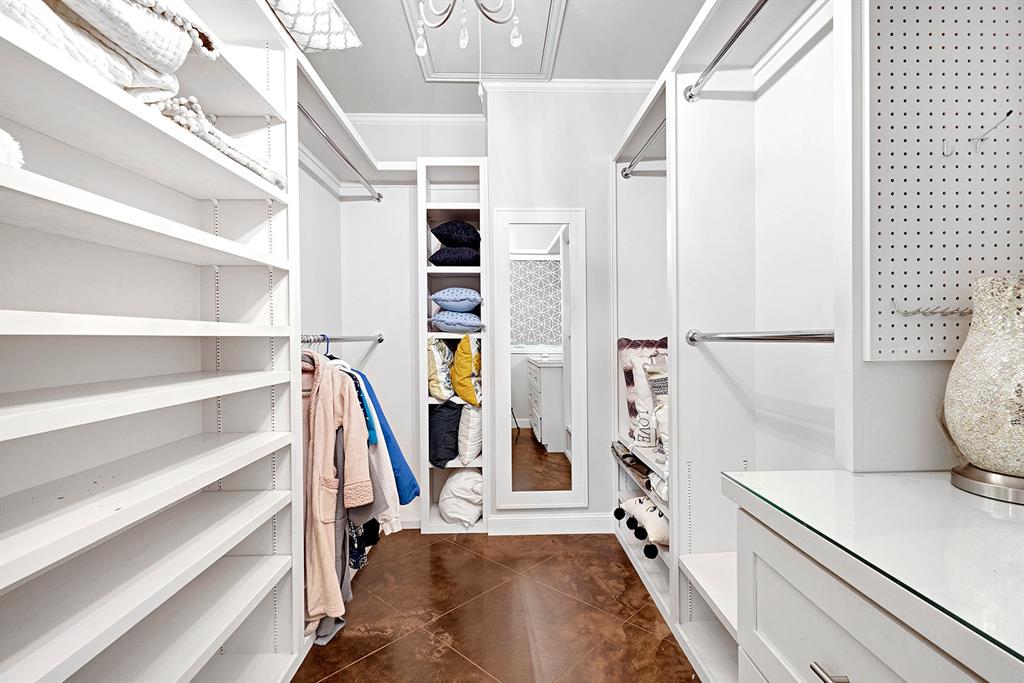 103 Glenn Road Mabank, TX 75156 - Photo 17 of 38 a view of walk in closet with empty racks