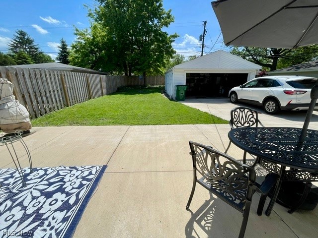 28634 Forest Road Willowick, OH 44095 - Photo 7 of 39 Expansive concrete patio area with a manicured lawn
