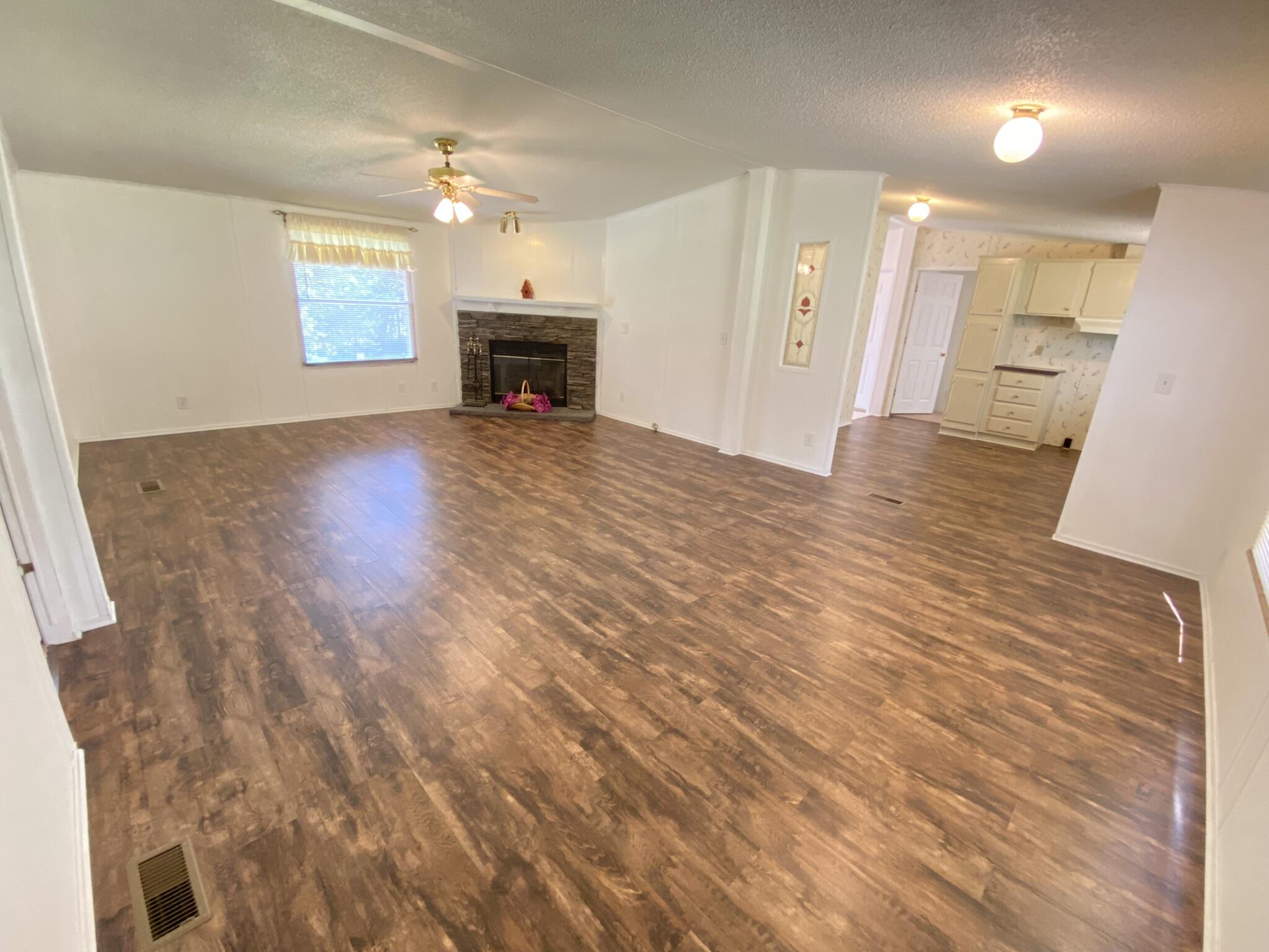 759 Briar Ridge Road Henry, VA 24102 - Photo 3 of 26 a view of a livingroom with a fireplace