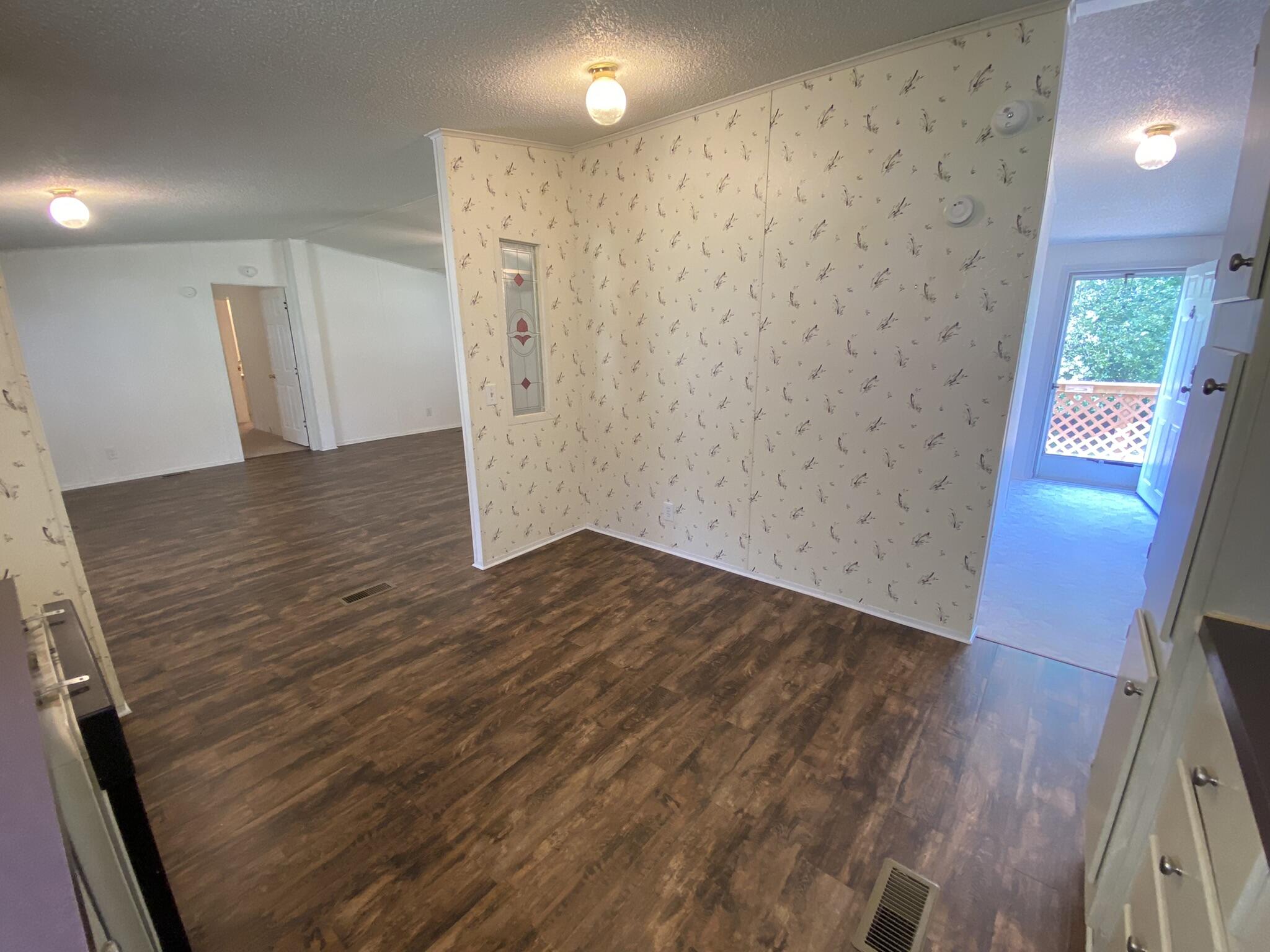759 Briar Ridge Road Henry, VA 24102 - Photo 8 of 26 a view of a hallway with wooden floor