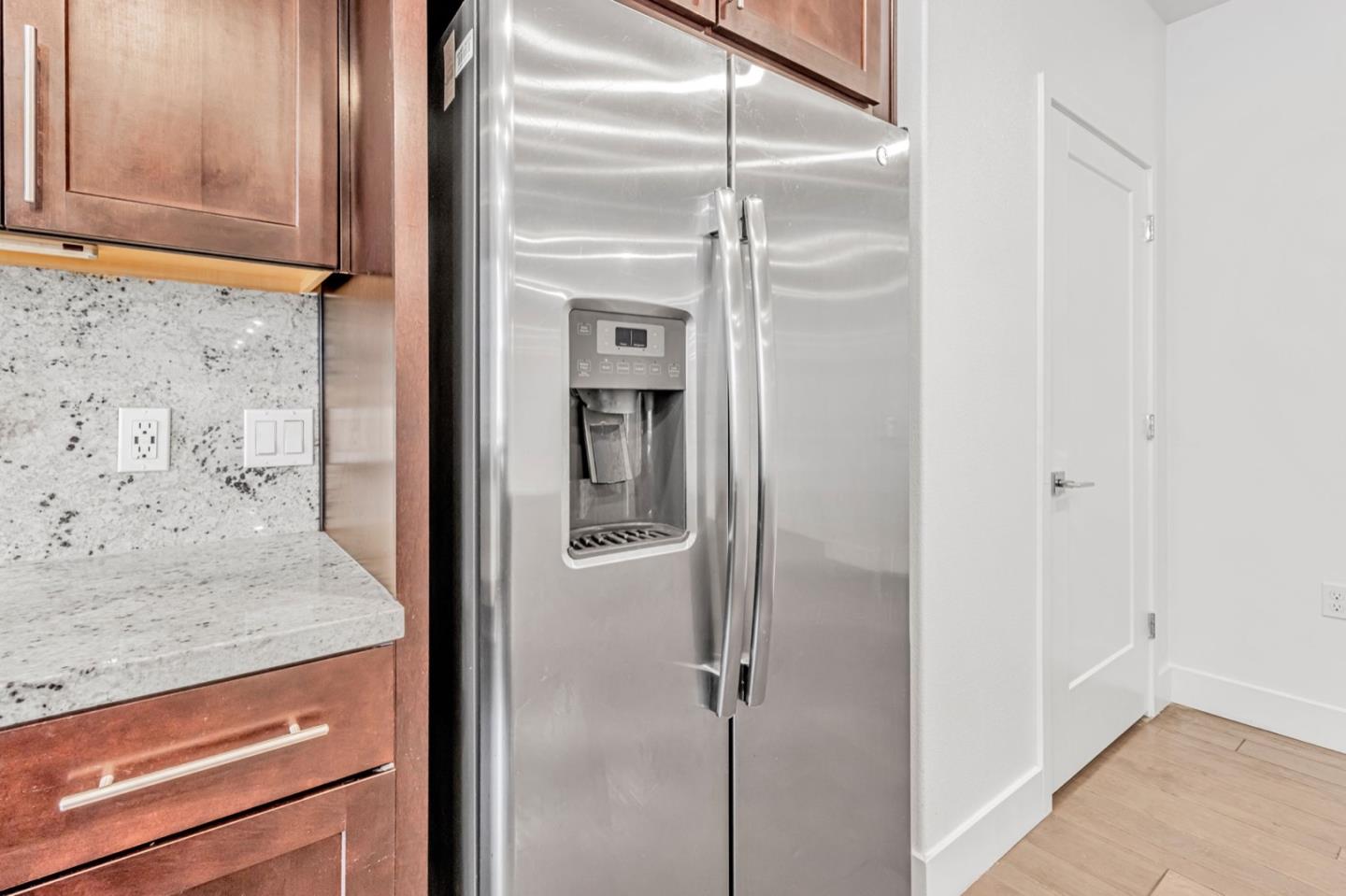 380 Riesling Avenue, Unit 21 Milpitas, CA 95035 - Photo 15 of 37 a bathroom with a granite countertop window and a shower