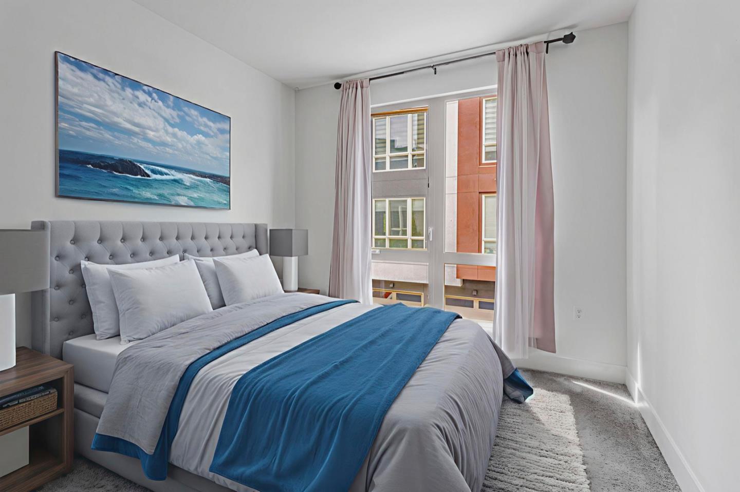 380 Riesling Avenue, Unit 21 Milpitas, CA 95035 - Photo 22 of 37 a bedroom with a bed and a painting on the wall