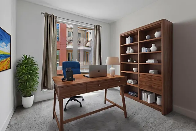 a view of a workspace with furniture