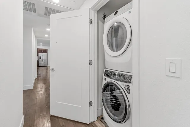 a view of a patio with table and chairs