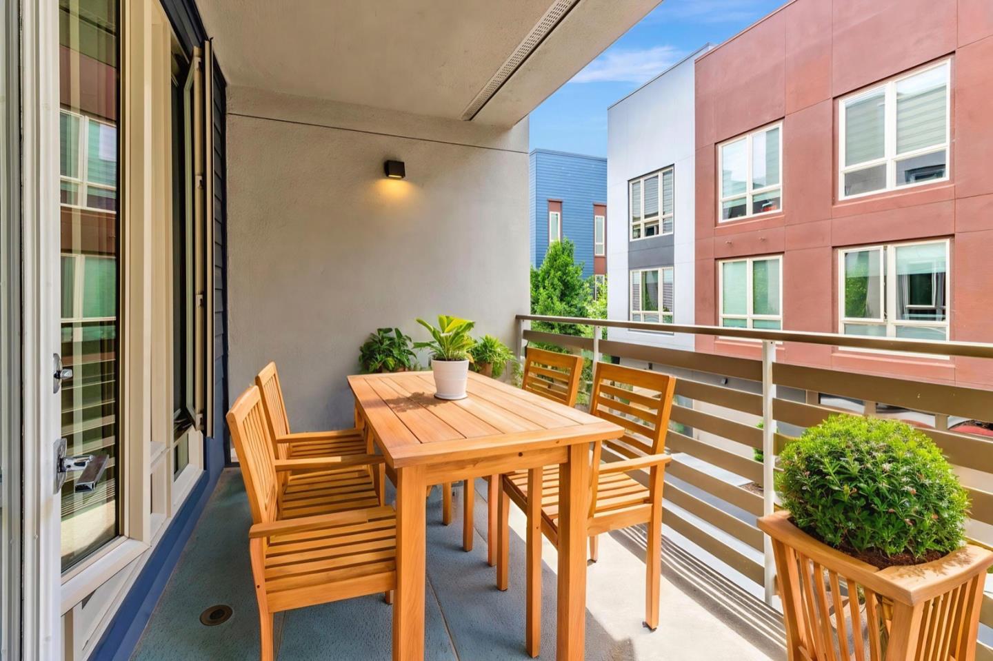 380 Riesling Avenue, Unit 21 Milpitas, CA 95035 - Photo 33 of 37 a view of a patio with table and chairs
