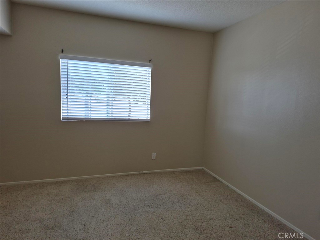 777 South Citrus Avenue, Unit 119 Azusa, CA 91702 - Photo 16 of 18 an empty room with a window