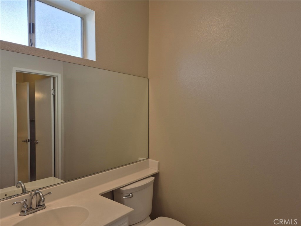 777 South Citrus Avenue, Unit 119 Azusa, CA 91702 - Photo 17 of 18 a bathroom with a sink and a toilet