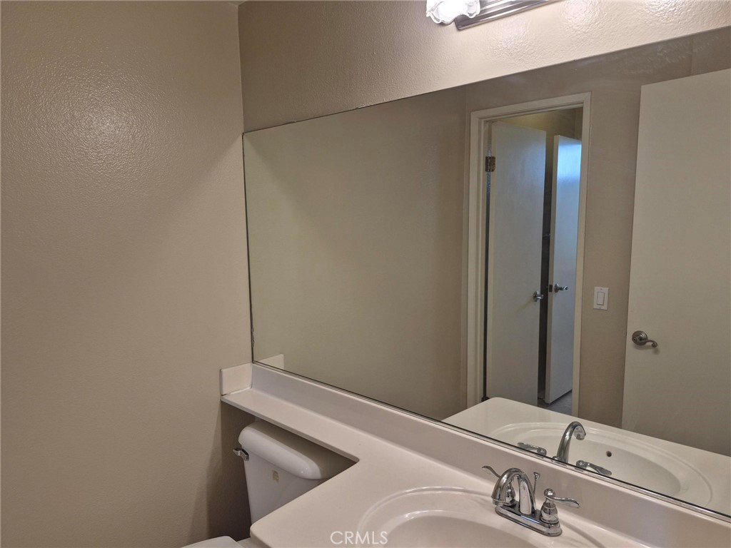 777 South Citrus Avenue, Unit 119 Azusa, CA 91702 - Photo 18 of 18 a bathroom with a sink and shower