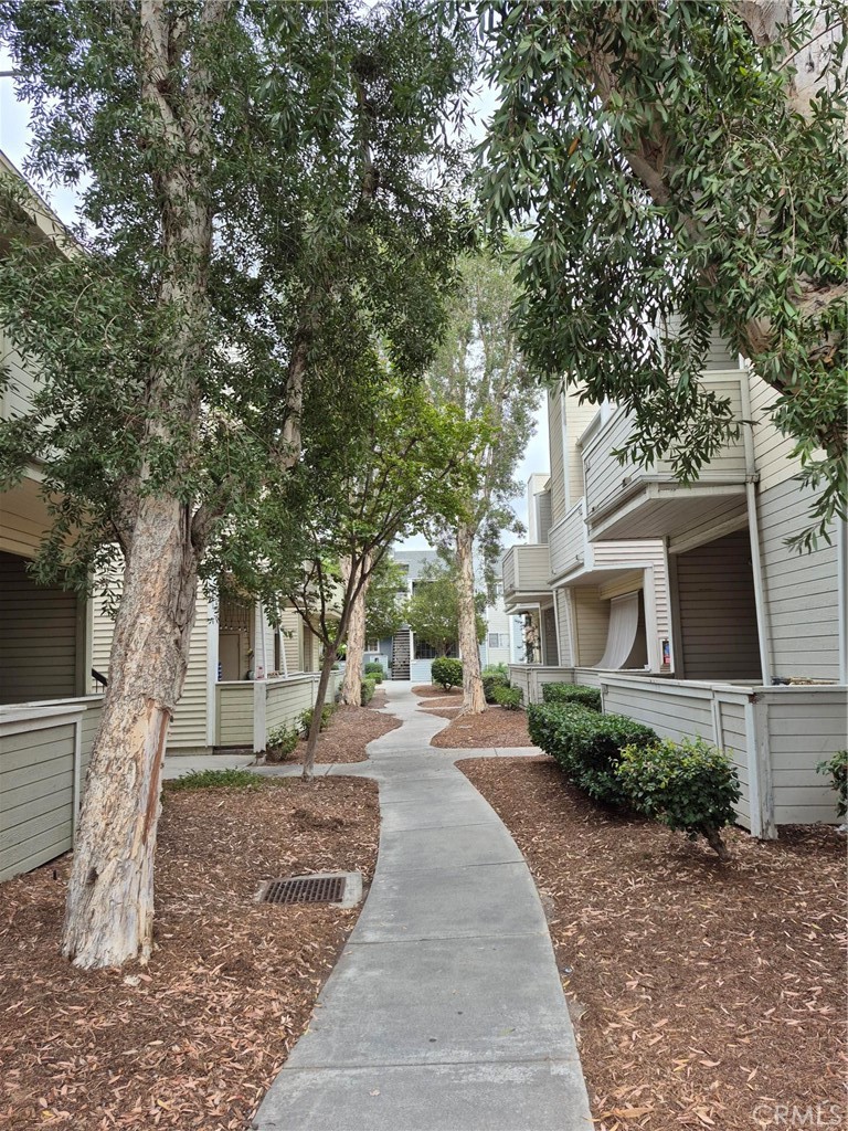 777 South Citrus Avenue, Unit 119 Azusa, CA 91702 - Photo 5 of 18 a house with trees in front of it