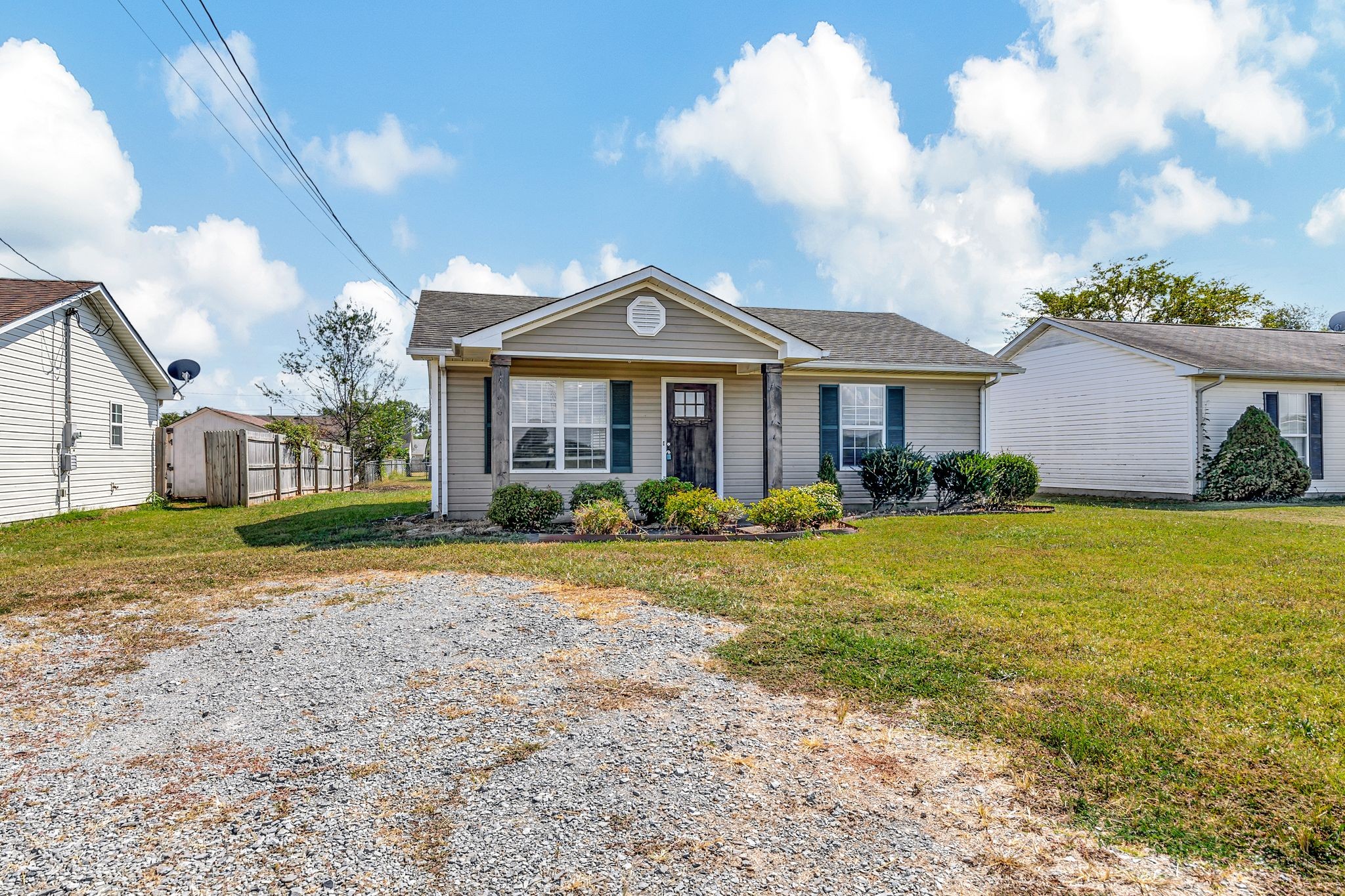 931 State Line Road Oak Grove, KY 42262 - Photo 1 of 24 a front view of a house with a yard