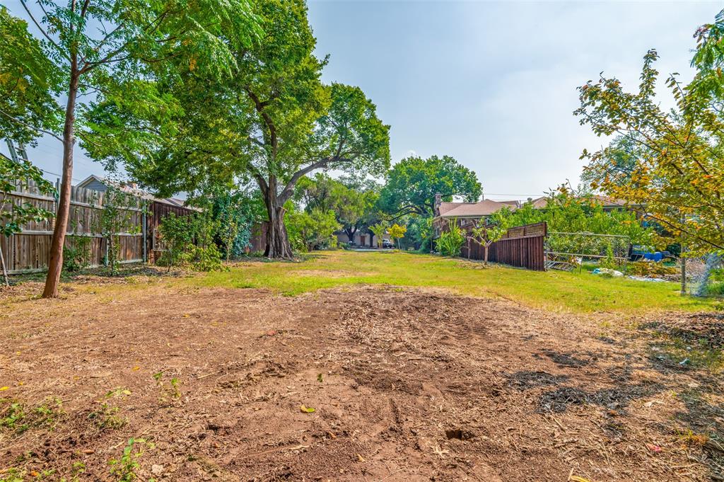 119 Archer Avenue Cockrell Hill, TX 75211 - Photo 6 of 8 a view of a swimming pool with an outdoor space