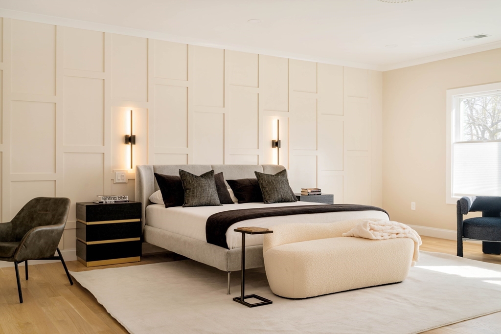 234 Valley Road Needham, MA 02492 - Photo 30 of 42 a bedroom with bed and a couch