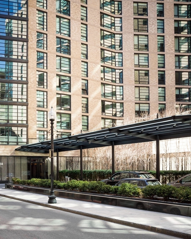 580 Washington Street, Unit PH5 Boston, MA 02111 - Photo 26 of 37 a view of a building and a street