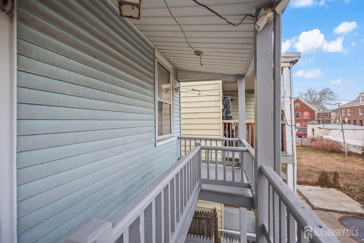 264 Barclay Street Perth Amboy, NJ 08861 - Photo 35 of 45 a view of balcony with wooden floor