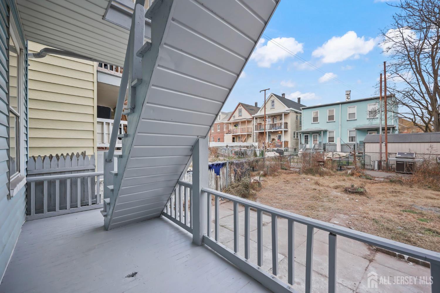 264 Barclay Street Perth Amboy, NJ 08861 - Photo 36 of 45 a view of a porch with a small yard