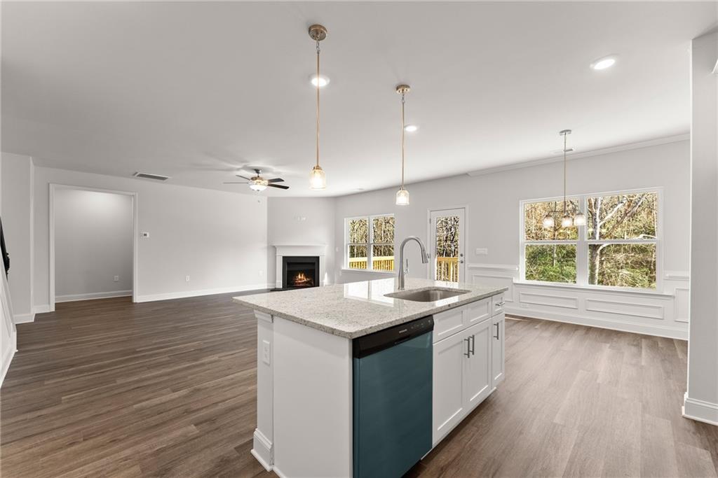 642 Bald Ridge Circle Demorest, GA 30535 - Photo 5 of 18 a kitchen with a sink stove and wooden floor