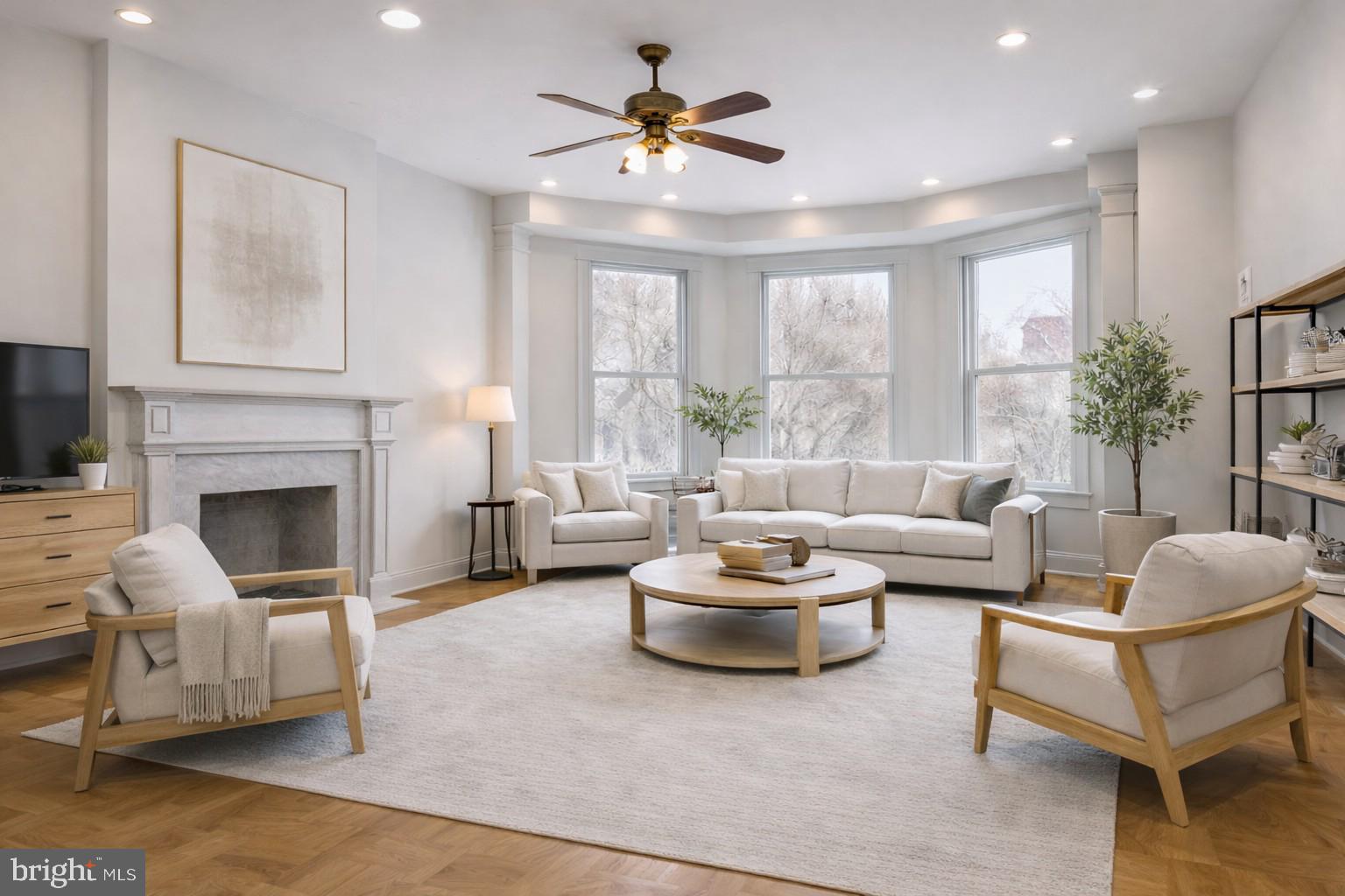 3110 18th Street Northwest Washington, DC 20010 - Photo 2 of 25 a living room with furniture and a fireplace