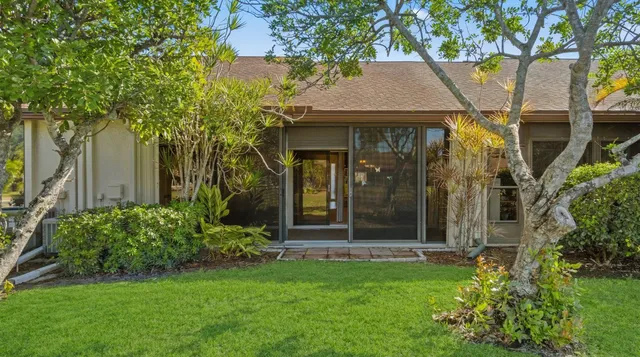 a bathroom with bathtub and shower