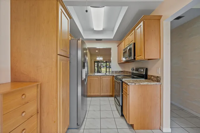 a view of a hallway with a bedroom