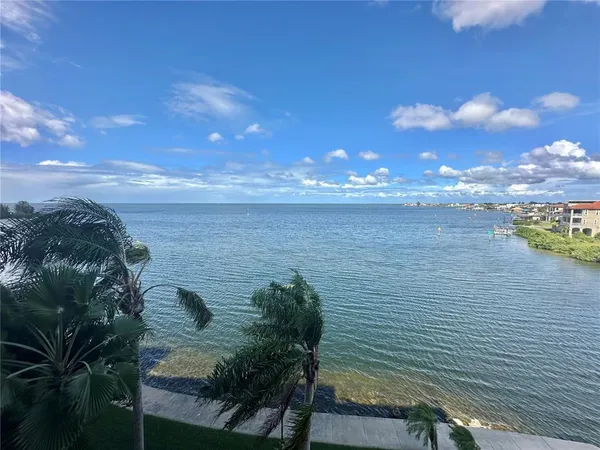 a view of a lake from a balcony