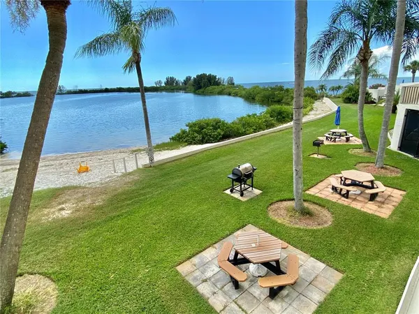 a view of a lake from a balcony
