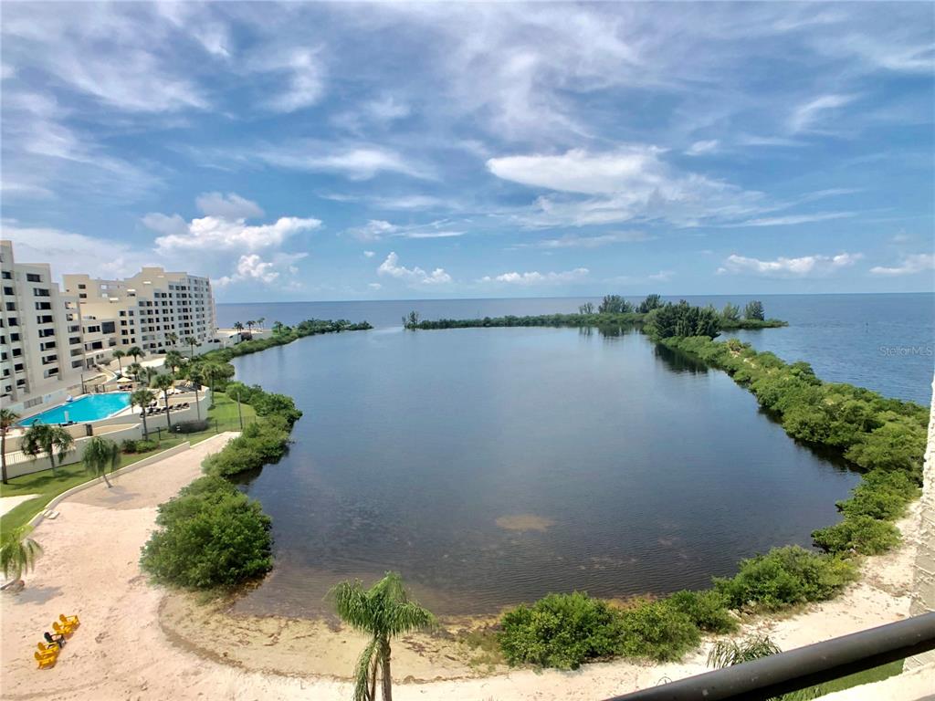 6035 Sea Ranch Drive, Unit 410 Hudson, FL 34667 - Photo 44 of 64 a view of a lake with a city view