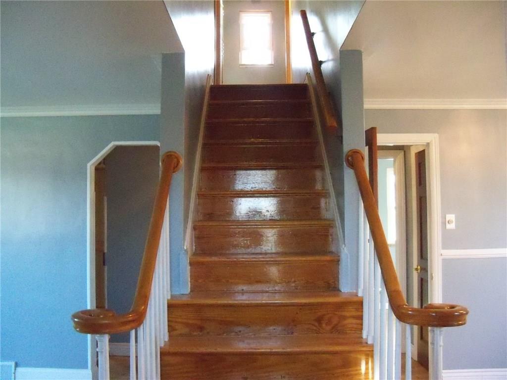 15 Ewing Road McKees Rocks, PA 15136 - Photo 3 of 23 Gorgeous oak entry stairs Open to Living and Dining room