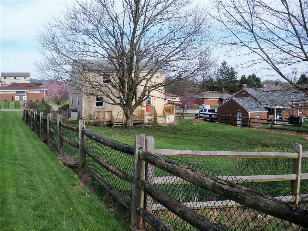 15 Ewing Road McKees Rocks, PA 15136 - Photo 22 of 23 Expansive fenced in back yard with newer deck
