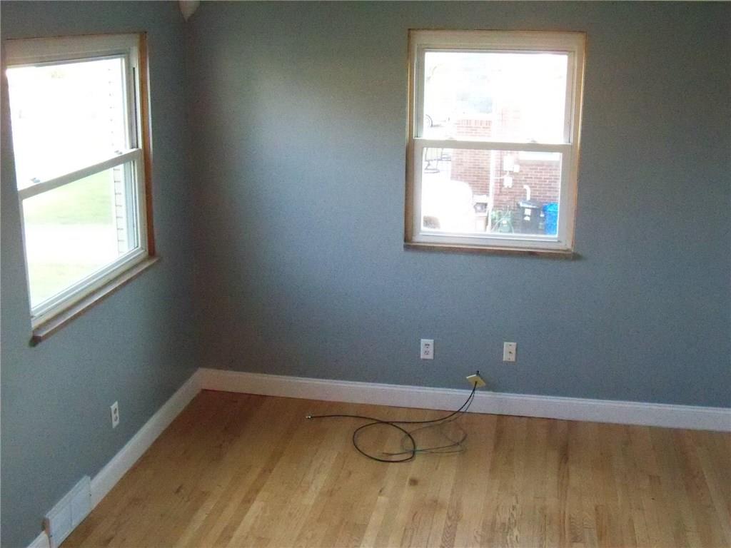 15 Ewing Road McKees Rocks, PA 15136 - Photo 5 of 23 Living room windows let tons of natural light in