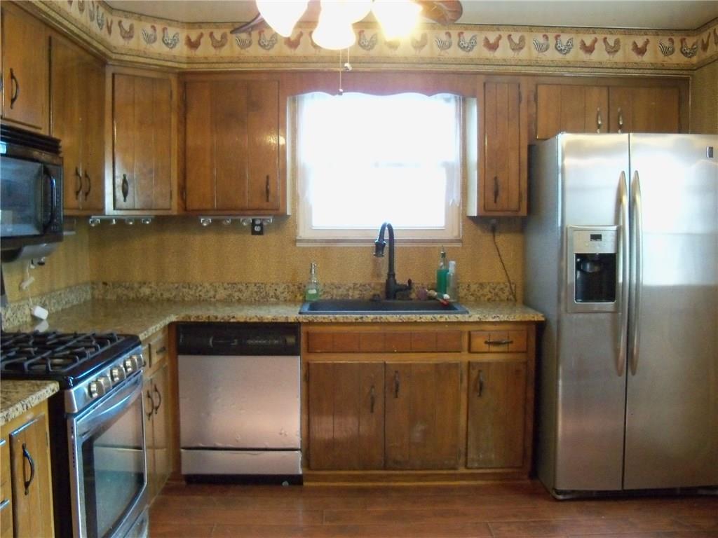 15 Ewing Road McKees Rocks, PA 15136 - Photo 9 of 23 Kitchen has tons of cabinet and counter space