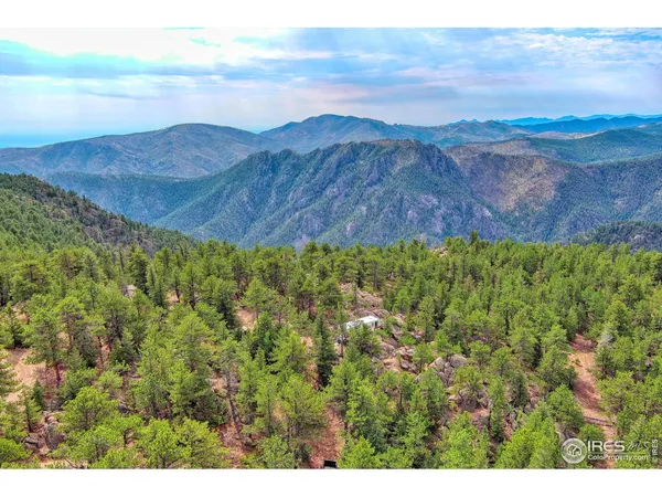 a view of an outdoor space and a mountain