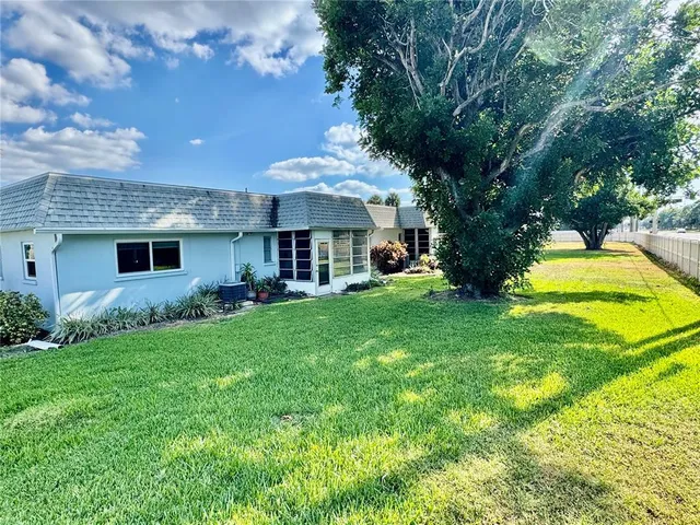 a view of a house with a garden