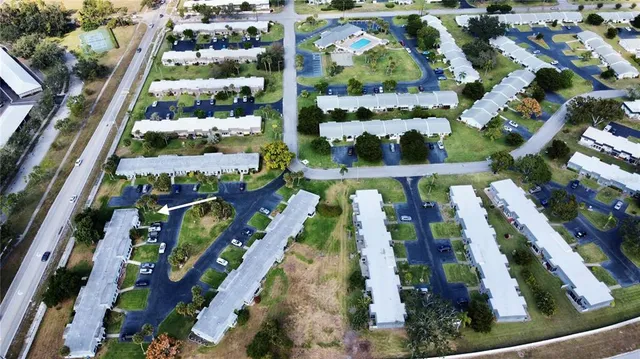 an aerial view of a house with a garden