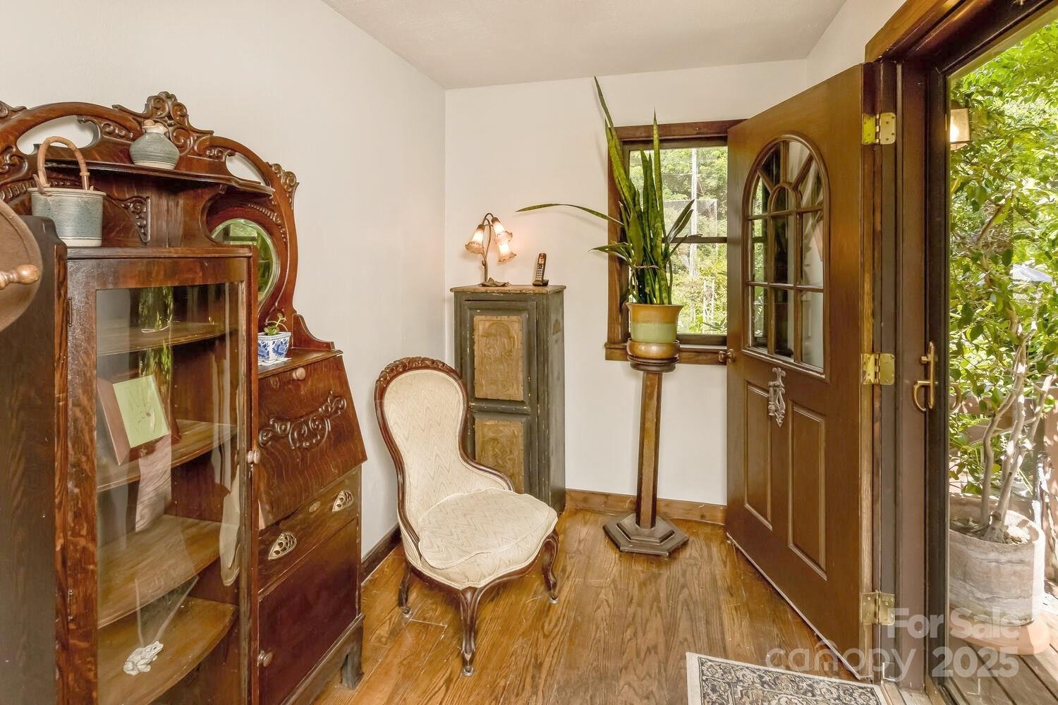 557 Tumbling Fork Road Waynesville, NC 28785 - Photo 3 of 44 a view of living room with furniture and a window