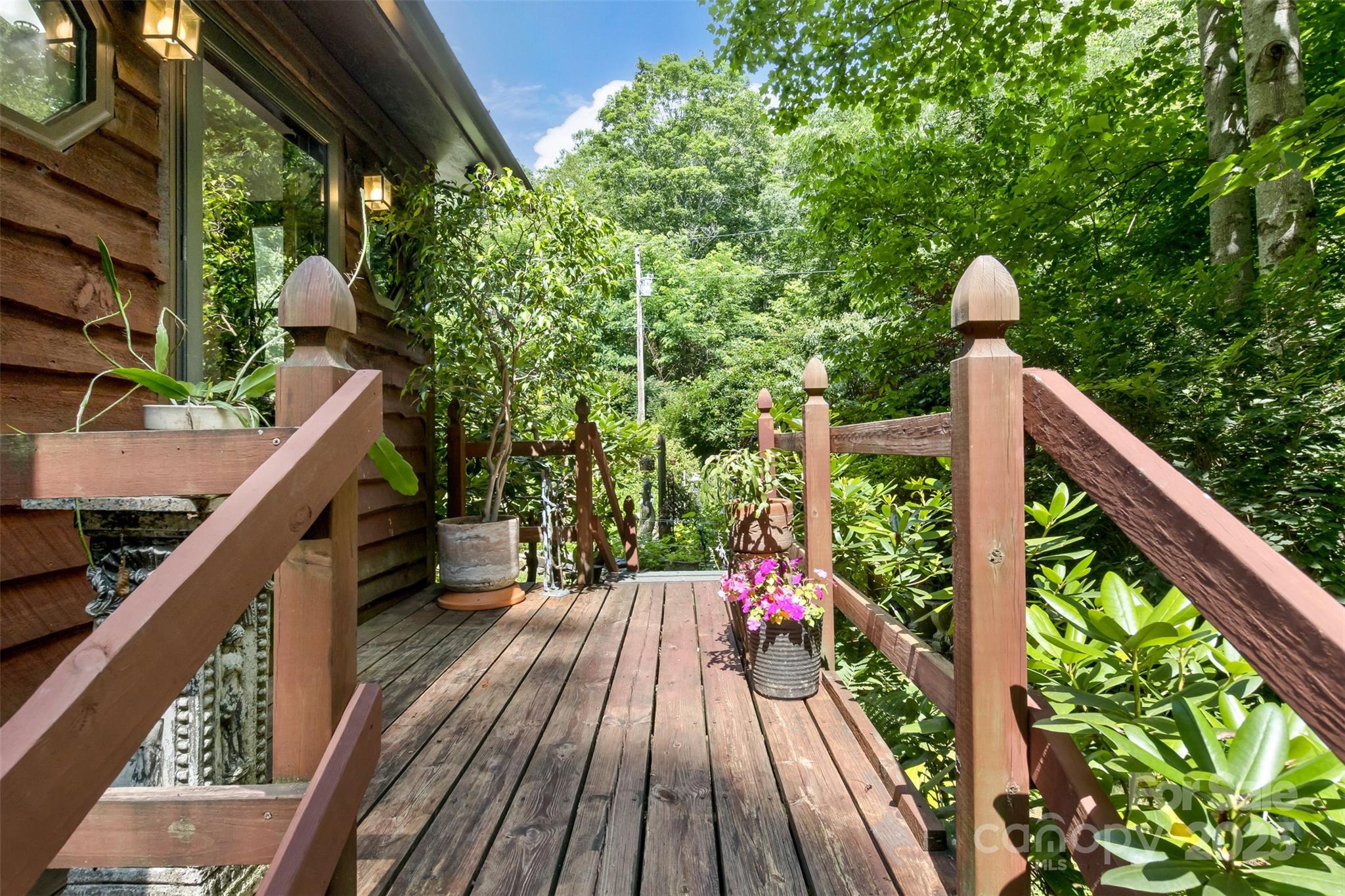 557 Tumbling Fork Road Waynesville, NC 28785 - Photo 42 of 44 a view of balcony with furniture