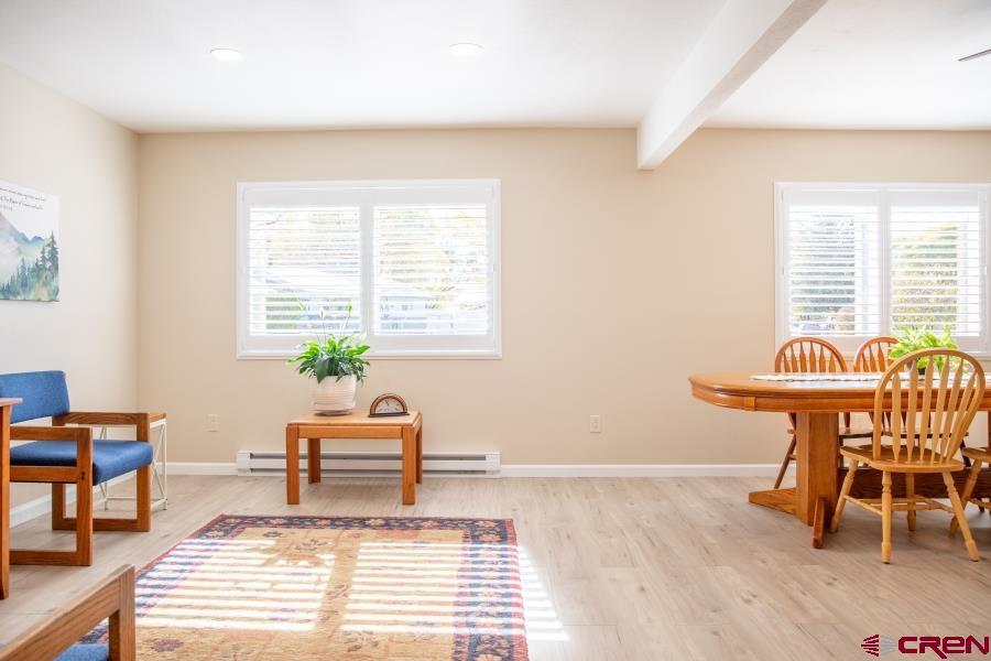 490 6403 Road Montrose, CO 81403 - Photo 14 of 40 a workspace with furniture and a window